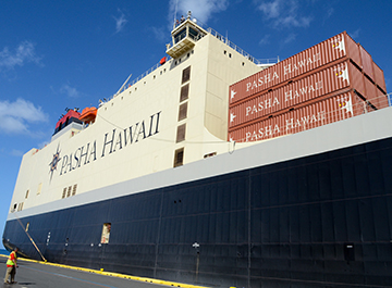 Shipping Containers stacked on top of Pasha Hawaii's MV Marjorie C vessel before departure to Hawaii.