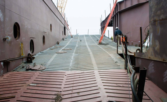 An engineer walks up the path to complete his inspections An engineer walks up the path to complete his inspections