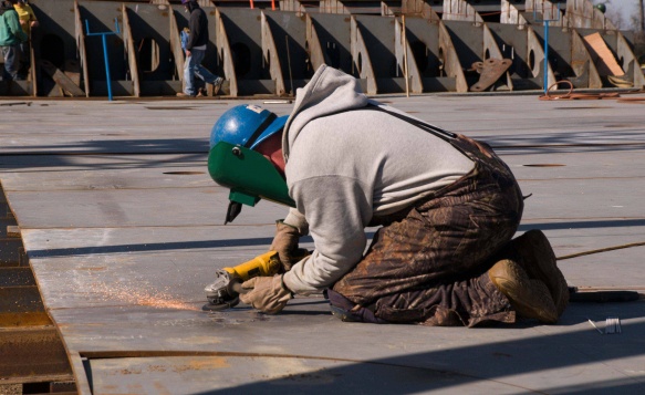 An engineer welds two parts together during construction of Pasha Hawaii's Marjorie C vessel An engineer welds two parts together during construction of Pasha Hawaii's Marjorie C vessel