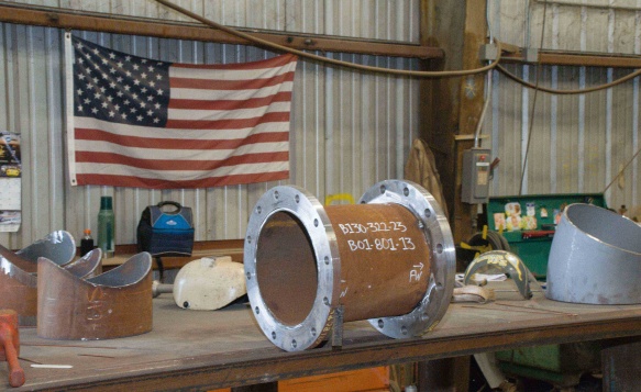 An American Flag proudly displayed at the US facility that built the new vessel