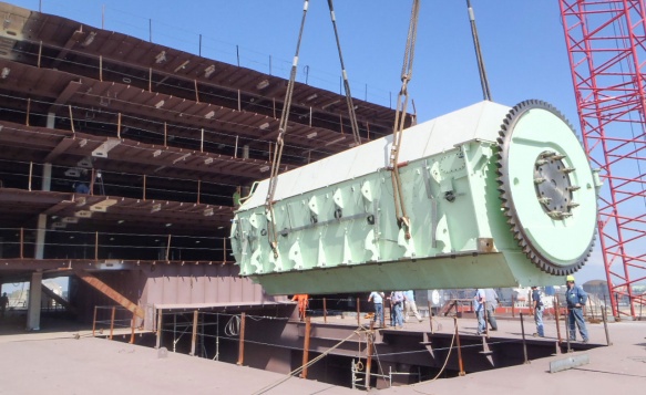 Engineers direct the Crane Operator on the placement of this key part Engineers direct the Crane Operator on the placement of this key part